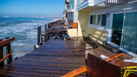 As waves push homes to the verge of collapse, city fast-tracks plan to ...