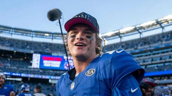J.J. McCarthy Shares Romantic Sideline Moment With Wife Before Making Giants Debut