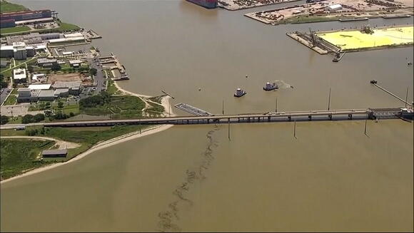 Barge slams into Galveston bridge causing collapse as oil spills into ...