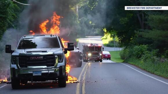 Gas tank ruptures as firefighters battle pickup truck fire on a ...