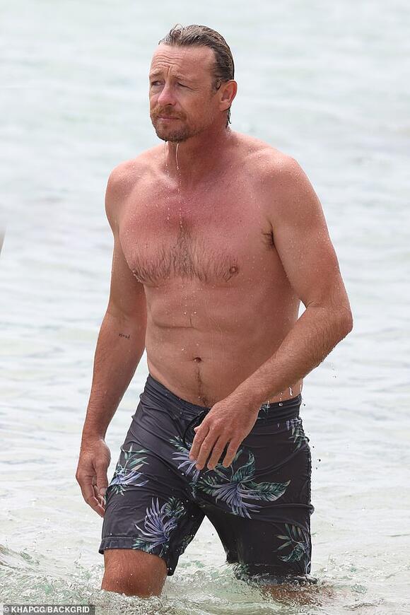 Just Like Fine Wine Shirtless Simon Baker 51 Proves He Is Getting Better With Age As He Shows Off His Fit Physique In The Surf News Break