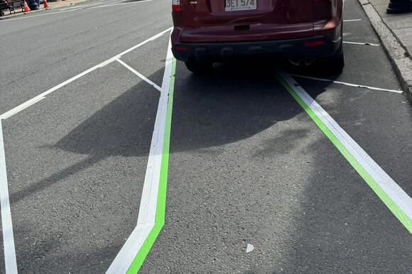 Duct-tape bike lane appears at Boston intersection following cyclist's ...