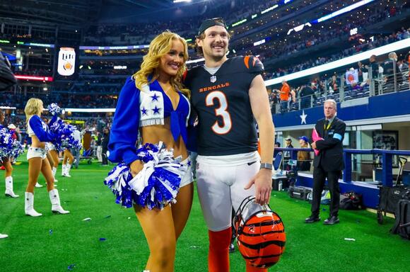 Dallas Cowboys cheerleader turns heads on her wedding day to NFL star husband – guests left 'thunderstruck' - NewsBreak