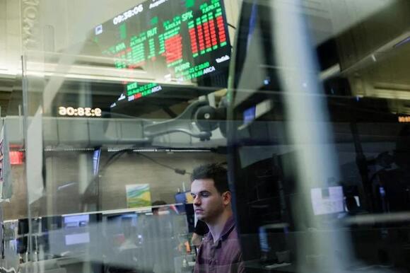 S&P 500 closes lower to end rocky week