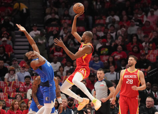 Durant and Smith each score 30 points to power the Rockets past the Mavericks 128-110 in the opener