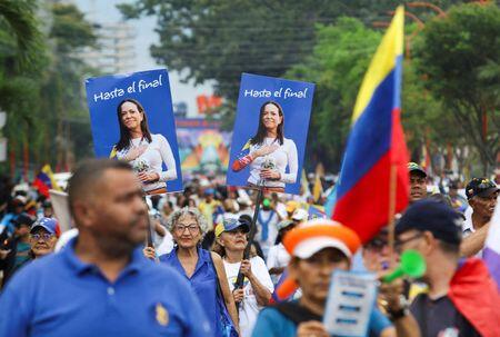 Awaiting Machado's return, Venezuela opposition looks ahead to elections