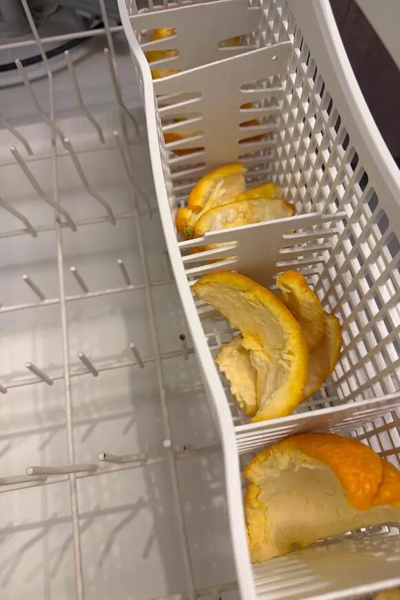 Why People Are Putting Orange Peels in the Dishwasher - NewsBreak