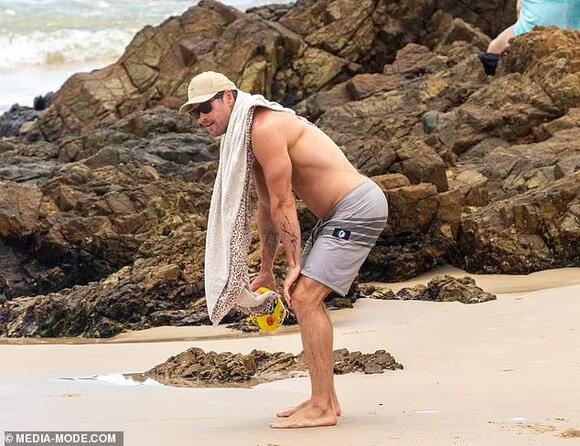 Elsa Pataky puts on an eye-popping display in a plunging white swimsuit ...