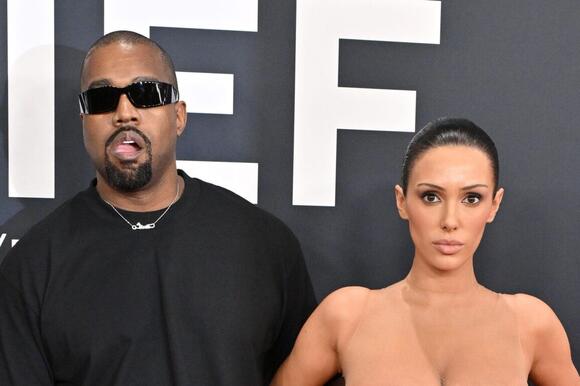 kanye west wife after party dress Kanye West's wife, Bianca Censori, rocked a barely-there bodysuit to a  Super Bowl after-party on Sunday. Check out videos of her look at the link  in bio! (Getty Images)
