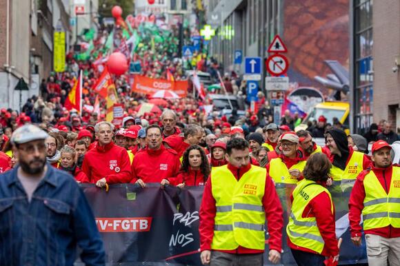 Police and masked protesters clash in Brussels as anti-austerity rally ...