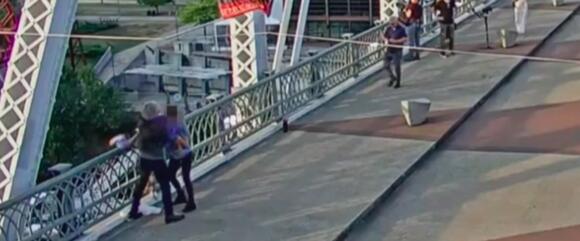 Jon Bon Jovi saves woman from jumping off edge of a pedestrian bridge