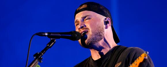 Man of the People: Country Star Zach Bryan Spotted Helping With ...