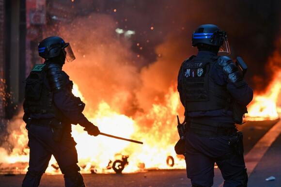 Around the world, far right blames immigrants for French protests