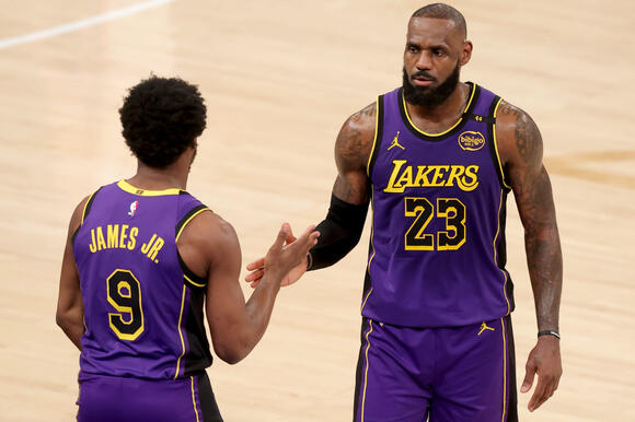 LeBron James Lets the Referee Know After No-Call While Still Securing ...