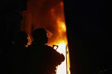 Violence flares in Paris after largely peaceful protests across France