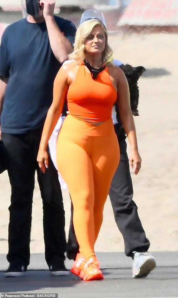 Bebe Rexha Shines Bright In A Neon Orange Tank Top And Matching Leggings On Set In Los Angeles Newsbreak