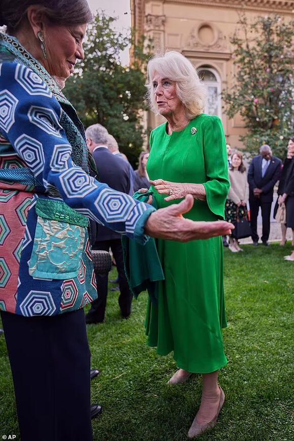 Queen Camilla is vibrant in bright green dress - as she and King Charles  enjoy glitzy evening reception during trip to Italy - NewsBreak