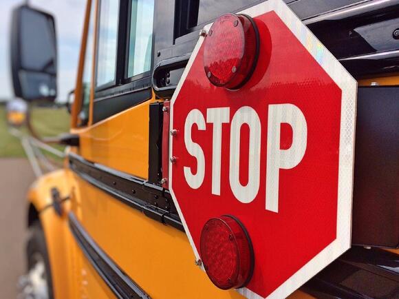 School bus carrying children rolls into parked car after driver leaves ...