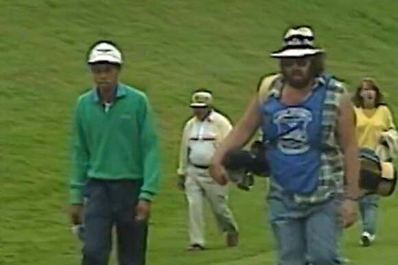 tiger woods cigarette caddy Woods' caddie, Mike Fluff Cowan, checking the wind with his during the 1997 Masters : r/golf The story behind why Tiger