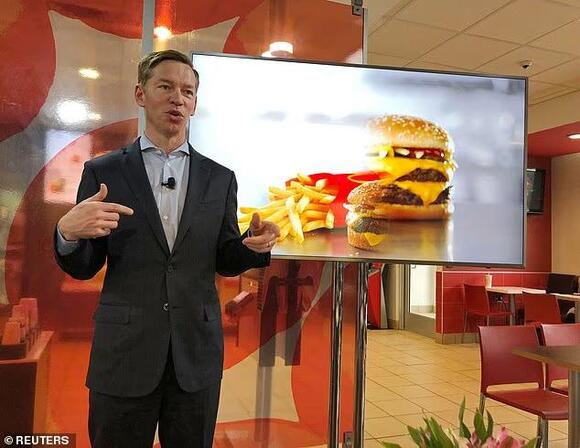 McDonald's CEO ridiculed for struggling to eat company burger in viral ...