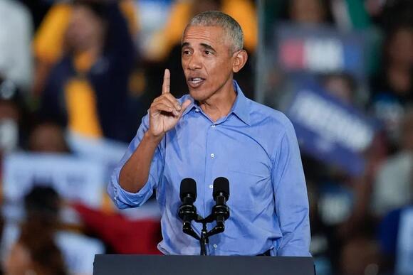 Obama plays offense and defense in Cleveland: Attacking Trump while guarding his legacy