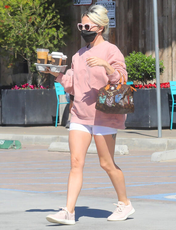 Lady Gaga Wears Short Shorts & Louis Vuitton Purse After Reuniting