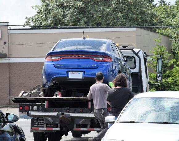 A woman says her car was towed by mistake, then spent days trying to ...