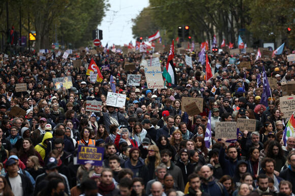 More than 400,000 protest across France, challenging Macron as Paris clashes erupt
