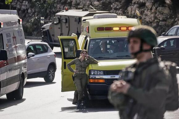 Israel shuts down West Bank after two soliders shot dead by Palestinian gunmen