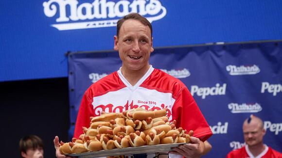 Joey Chestnut Returns to Hot Dog Eating Contest After Ban - NewsBreak