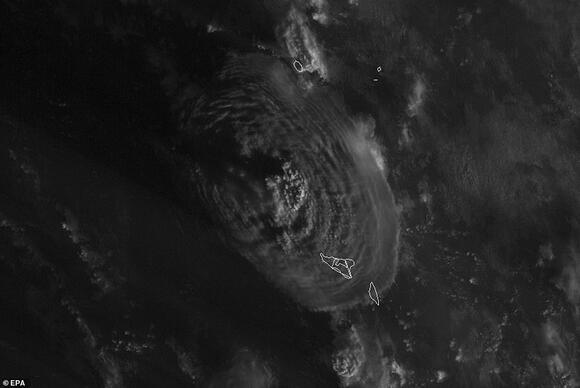 Devastating photos show tsunami raging through villages in Tonga as ...