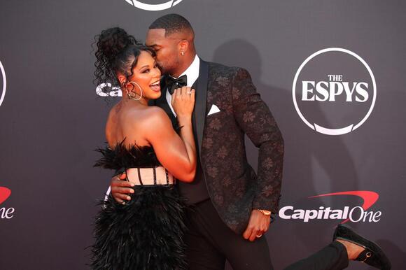 image Bianca Belair Cheers Her Husband to the Top of WWE – But Had to Teach Him How to Climb Without Shaking!"