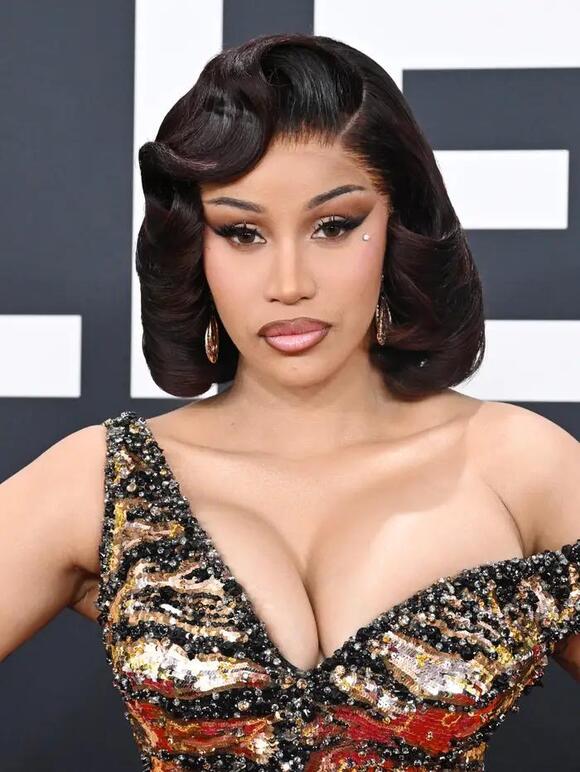image Cardi B Just Called Out a WWE Legend Before SummerSlam — And Fans Are Losing It Over What She Said