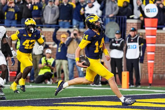 Kyle Whittingham declines to name Michigan's starting QB for Indiana