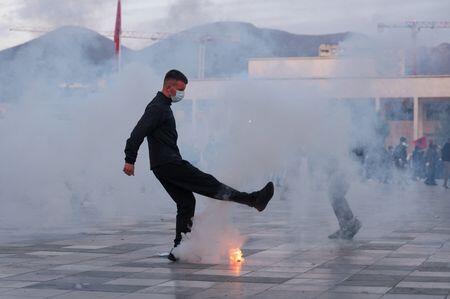 Albanian police fire tear gas as anti-government student protests turn violent