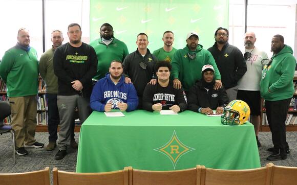 SIGNING DAY: Three Raider football players ink college careers - NewsBreak