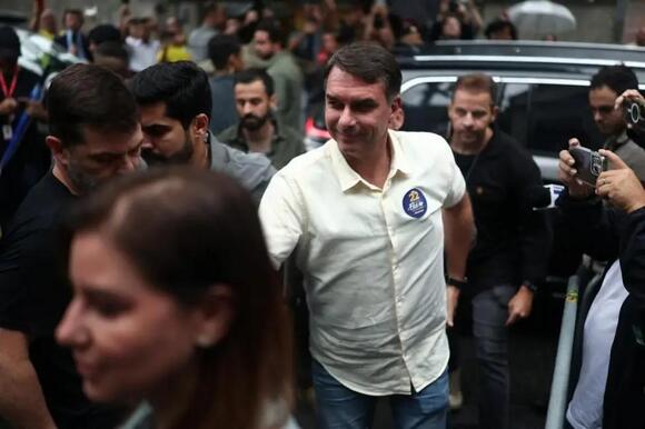 Voters in Brazil head to polls as Lula goes up against Bolsonaro's son