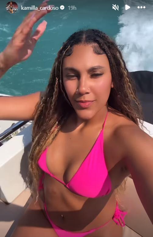 kamilla cardoso pink dress SPOTTED: Ex South Carolina Standout Kamilla Cardoso Sets Sail While Posing  In Bright Pink Bikini