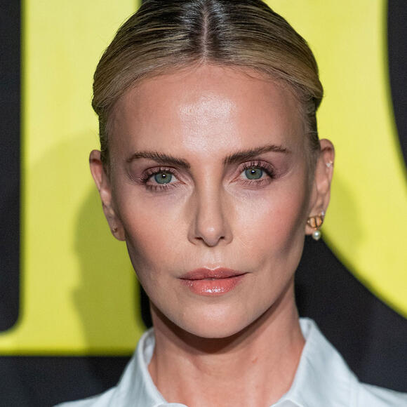 Charlize Theron Paired a Totally See-Through Beaded Maxiskirt With Black  Underwear and a Button-Down