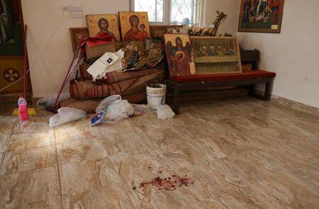 Jordan church attack survivor says assailant pointed handgun at him