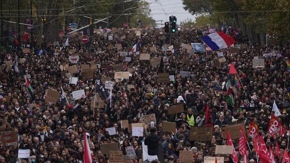 Police say 110,000 people march in Paris as protest ends with tear gas and water cannon