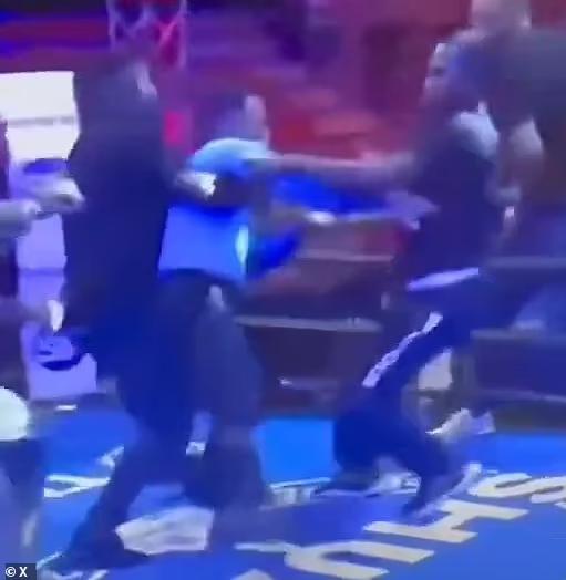 Chaos erupts at boxing match as referee is swarmed by attackers after ...