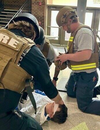 Local law enforcement, fire departments and rescue personnel take part ...