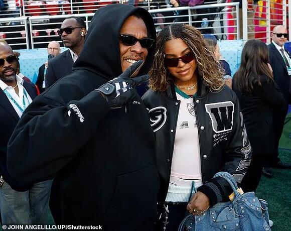 Jay-Z and Beyonce's daughter Rumi runs riot at Super Bowl before being ...