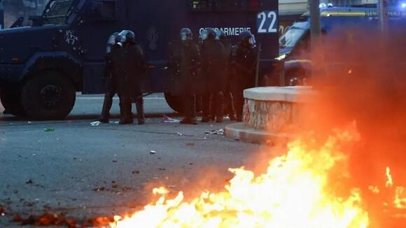 Almost 1,000 arrested in protests across France, minister says, as clashes erupt