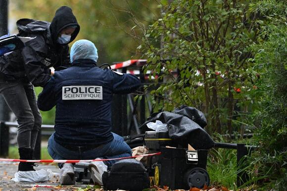 A shooting in the Paris suburbs kills 1 and wounds five in a suspected racist attack