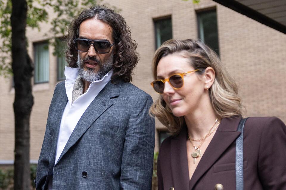 Meet the woman who is standing by Russell Brand as he goes on trial ...