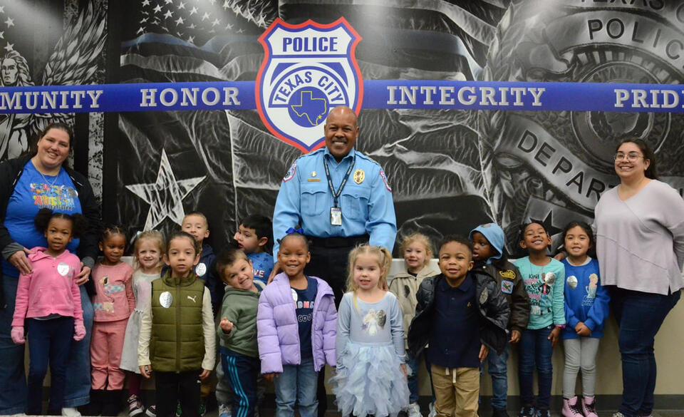 Children from Raising Stars Stem Center visit the police department to ...