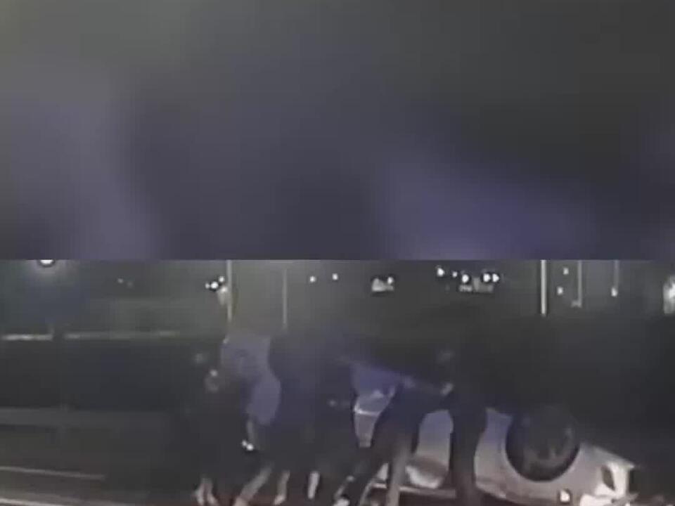 Police officer bystanders lift a nearly twoton car to save a teenagers life after crash
