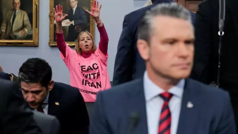 Top Trump general confronted by protesters at hearing: 'Tax dollars ...